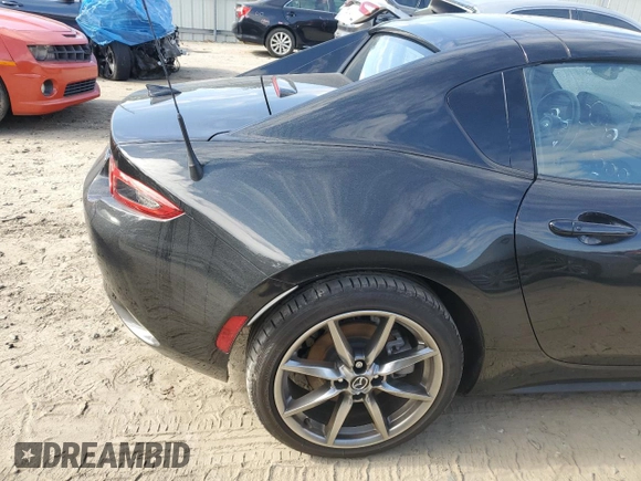 2022 Mazda MX-5 Miata Grand Touring z VIN JM1NDAM78N0507632, wystawiony jako Copart lot #81311754 z przebiegiem 4 720 mil mil oraz Szkoda całkowita • Salvage title. Historia ofert i sprzedaży dostępna na DreamBid. Obrazek 10.