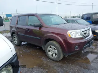 2010 Honda Pilot LX z VIN 5FNYF4H21AB015141, wystawiony jako IAAI lot #42132874 z przebiegiem 152 324 mil mil oraz . Historia ofert i sprzedaży dostępna na DreamBid. Obrazek 1.