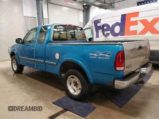 1997 Ford F-150 XL with VIN 1FTDX186XVKC03985, listed as a Copart auction lot 52808035 with 274,590 mi miles and Clean title. Bid and sale history available at DreamBid. Image 2.