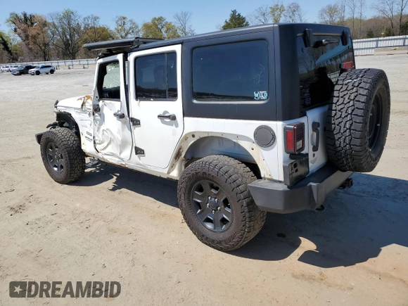 2015 Jeep Wrangler Unlimited Sport RHD with VIN 1C4BJWKG0FL690763, listed as a Copart auction lot 48823714 with 156,714 mi miles and Salvage title. Bid and sale history available at DreamBid. Image 2.