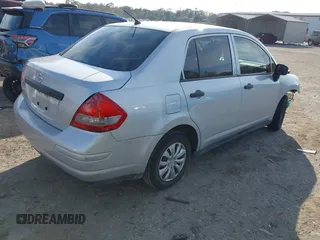 2010 Nissan Versa 1.6 with VIN 3N1CC1AP5AL422567, listed as a IAAI auction lot 41463273 with 167,038 mi miles. Bid and sale history available at carsss.com. Image 4.
