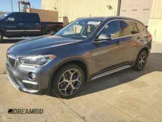 2016 BMW X1 xDrive28i z VIN WBXHT3Z30G4A47563, wystawiony jako Copart lot #50252555 z przebiegiem 99 975 mil mil oraz Szkoda całkowita • Salvage title. Historia ofert i sprzedaży dostępna na DreamBid. Obrazek 1.