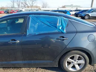 2015 Kia Optima LX with VIN 5XXGM4A75FG394494, listed as a IAAI auction lot 41596274 with 1 mi miles. Bid and sale history available at carsss.com. Image 6.