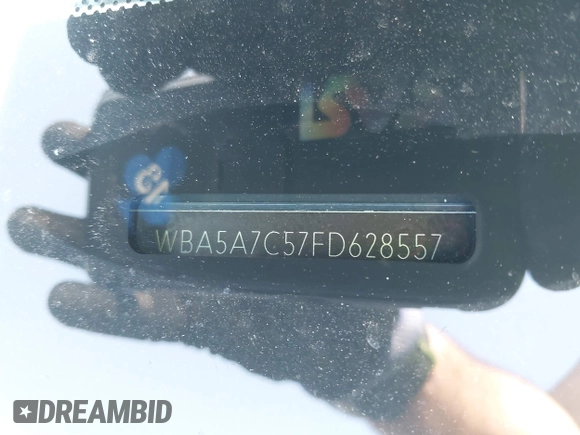 2015 BMW 5 Series 528i xDrive with VIN WBA5A7C57FD628557, listed as a IAAI auction lot 42519487 with 167,049 mi miles and . Bid and sale history available at DreamBid. Image 17.
