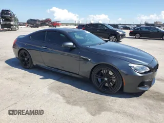 2016 BMW M6 z VIN WBS6J9C59GD934530, wystawiony jako Copart lot #72057354 z przebiegiem 46 549 mil mil oraz Nie do naprawy. Historia ofert i sprzedaży dostępna na DreamBid. Obrazek 3.