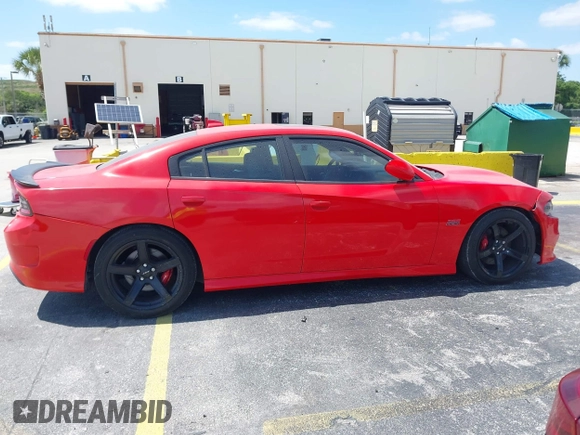 2020 Dodge Charger Scat Pack z VIN 2C3CDXGJ6LH197320, wystawiony jako IAAI lot #42158001 z przebiegiem 27 912 mil mil oraz . Historia ofert i sprzedaży dostępna na DreamBid. Obrazek 13.