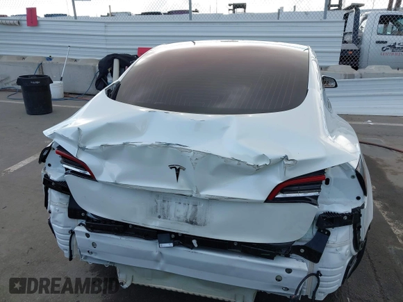 2018 Tesla Model 3 Long Range Battery with VIN 5YJ3E1EA3JF023300, listed as a IAAI auction lot 41925504 with 100,512 mi miles and . Bid and sale history available at DreamBid. Image 17.