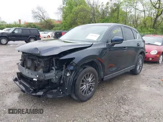 2017 Mazda CX-5 Touring z VIN JM3KFBCL4H0156571, wystawiony jako IAAI lot #42183562 z przebiegiem 135 595 mil mil oraz . Historia ofert i sprzedaży dostępna na DreamBid. Obrazek 20.