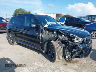 2021 BMW X3 M with VIN 5YMTS0C02M9G18841, listed as a IAAI auction lot 42663853 with 65,733 mi miles and . Bid and sale history available at DreamBid. Image 1.