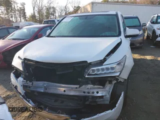 2016 Acura MDX with VIN 5FRYD3H23GB015536, listed as a IAAI auction lot 41424741 with 88,464 mi miles. Bid and sale history available at carsss.com. Image 12.