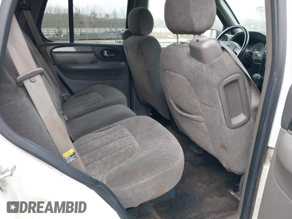 2004 GMC Envoy SLE with VIN 1GKDT13SX42357048, listed as a IAAI auction lot 41601126 with 304,101 mi miles. Bid and sale history available at carsss.com. Image 8.