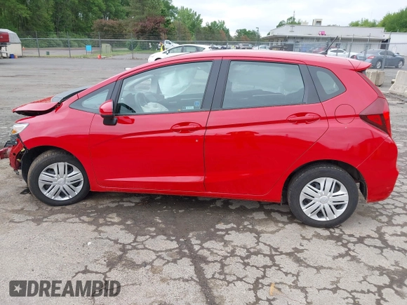 2019 Honda Fit LX z VIN 3HGGK5H43KM727020, wystawiony jako IAAI lot #42372741 z przebiegiem 56 000 mil mil oraz . Historia ofert i sprzedaży dostępna na DreamBid. Obrazek 14.