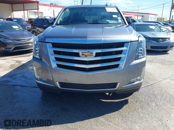2018 Cadillac Escalade Luxury z VIN 1GYS3BKJ0JR147752, wystawiony jako IAAI lot #41419140 z przebiegiem 124 376 mil mil oraz . Historia ofert i sprzedaży dostępna na DreamBid. Obrazek 13.