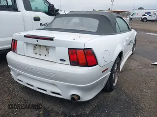 2000 Ford Mustang with VIN 1FAFP4440YF265297, listed as a IAAI auction lot 41739266 with 170,907 mi miles. Bid and sale history available at carsss.com. Image 4.