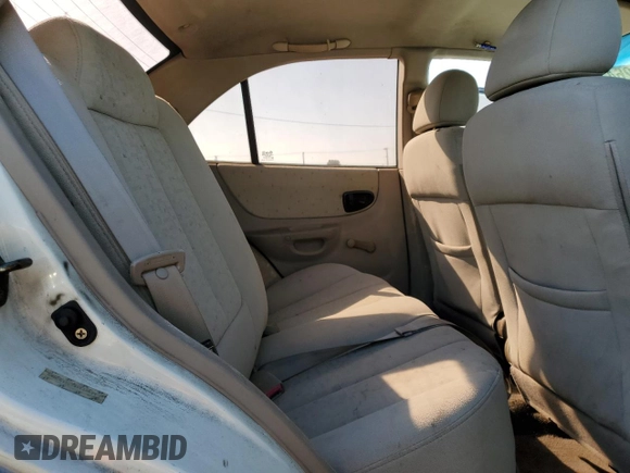2004 Hyundai Accent GL with VIN KMHCG45C74U550647, listed as a Copart auction lot 74526474 with 115,838 mi miles and Salvage Title. Bid and sale history available at carsss.com. Image 10.