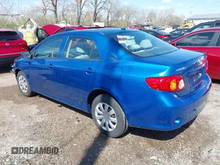 2010 Toyota Corolla with VIN 2T1BU4EEXAC373868, listed as a IAAI auction lot 41949249 with 154,538 mi miles. Bid and sale history available at carsss.com. Image 3.