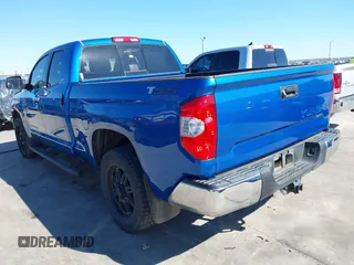2016 Toyota Tundra SR z VIN 5TFRM5F13GX095535, wystawiony jako IAAI lot #41618316 z przebiegiem 131 386 mil mil oraz . Historia ofert i sprzedaży dostępna na DreamBid. Obrazek 3.