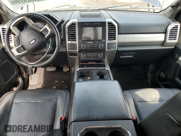 2017 Ford F-250 XLT with VIN 1FT7X2B61HEE53047, listed as a Copart auction lot 63029795 with 113,225 mi miles and Salvage title. Bid and sale history available at DreamBid. Image 8.