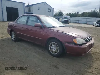 2003 Kia Spectra with VIN KNAFB121935241589, listed as a Copart auction lot 71933194 with 61,738 mi miles and Salvage Title. Bid and sale history available at DreamBid. Image 4.