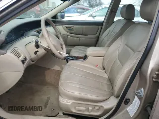 2000 Toyota Avalon XL z VIN 4T1BF28B8YU008033, wystawiony jako Copart lot #45644285 z przebiegiem 144 772 mil mil oraz Szkoda całkowita • Salvage title. Historia ofert i sprzedaży dostępna na DreamBid. Obrazek 7.
