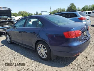 2014 Volkswagen Jetta SE with VIN 3VWD17AJ9EM323625, listed as a Copart auction lot 58211655 with 108,099 mi miles and Salvage title. Bid and sale history available at DreamBid. Image 2.