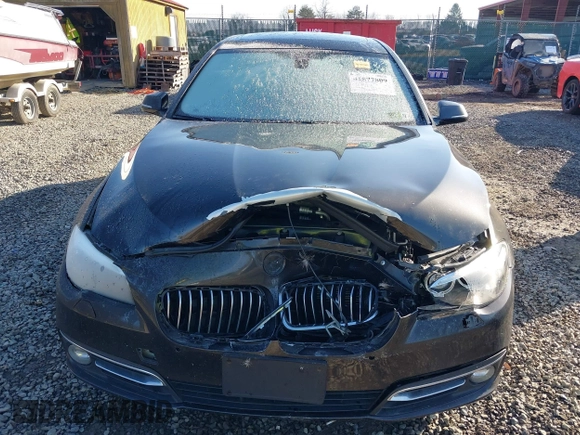 2014 BMW 5 Series 528i xDrive with VIN WBA5A7C54ED616297, listed as a IAAI auction lot 41877809 with 147,874 mi miles and . Bid and sale history available at DreamBid. Image 6.
