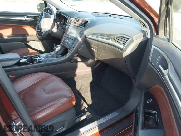 2016 Ford Fusion Titanium with VIN 3FA6P0K92GR210990, listed as a IAAI auction lot 42537176 with 122,111 mi miles and . Bid and sale history available at DreamBid. Image 5.