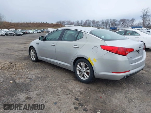 2013 Kia Optima LX with VIN 5XXGM4A74DG129353, listed as a IAAI auction lot 42035909 with 140,315 mi miles. Bid and sale history available at carsss.com. Image 3.
