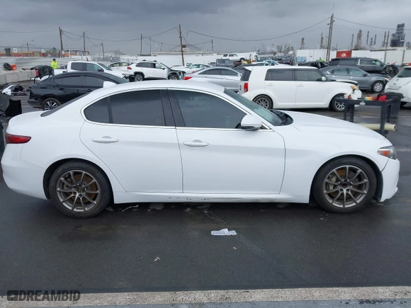 2019 Alfa Romeo Giulia with VIN ZARFAMANXK7600498, listed as a IAAI auction lot 41777643 with 100,492 mi miles. Bid and sale history available at carsss.com. Image 13.