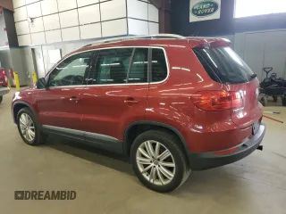 2014 Volkswagen Tiguan SEL с VIN WVGBV3AX8EW026076, выставлен на аукционе Copart как лот 65003585 с пробегом 104 473 миль миль и Чистый • Clean title. История ставок и продаж доступна на DreamBid. Изображение 2.