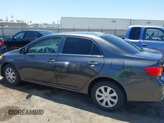 2010 Toyota Corolla z VIN 1NXBU4EE7AZ199417, wystawiony jako IAAI lot #42202363 z przebiegiem 180 378 mil mil oraz . Historia ofert i sprzedaży dostępna na DreamBid. Obrazek 15.
