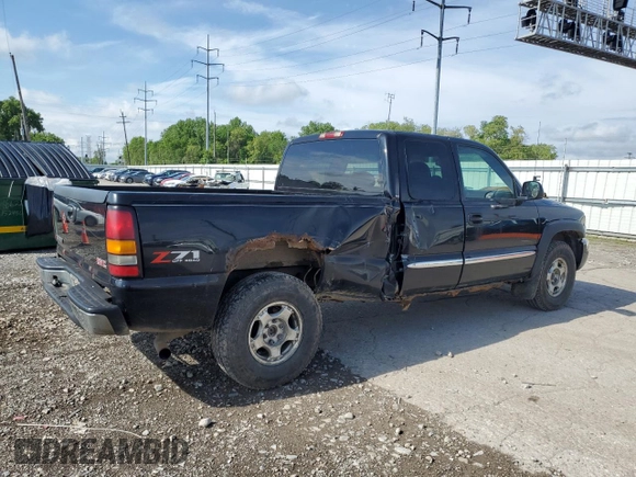2004 GMC Sierra 1500 SLE with VIN 1GTEK19T54E305571, listed as a Copart auction lot 56954375 with 174,649 mi miles and Salvage title. Bid and sale history available at DreamBid. Image 3.