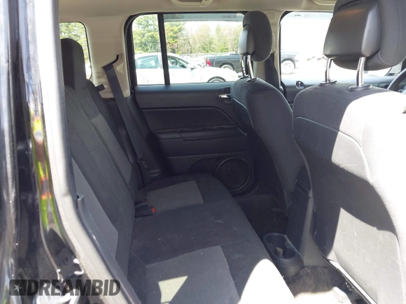 2014 Jeep Patriot Sport with VIN 1C4NJRBB1ED811019, listed as a IAAI auction lot 42181813 with 124,837 mi miles and . Bid and sale history available at DreamBid. Image 8.