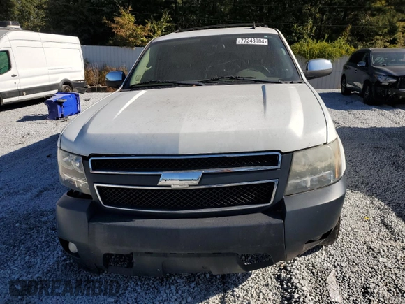 2011 Chevrolet Suburban LT with VIN 1GNSCJE00BR264551, listed as a Copart auction lot 77248984 with 225,092 mi miles and Clean Title. Bid and sale history available at carsss.com. Image 5.