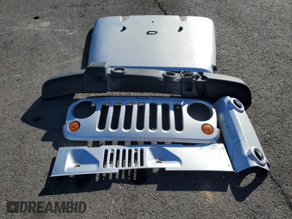 2007 Jeep Wrangler Unlimited Sahara with VIN 1J4GB59197L144781, listed as a Copart auction lot 48678315 with 137,538 mi miles and Salvage title. Bid and sale history available at DreamBid. Image 13.