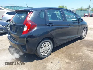 2015 Honda Fit LX z VIN 3HGGK5H56FM712266, wystawiony jako IAAI lot #42378228 z przebiegiem 140 423 mil mil oraz . Historia ofert i sprzedaży dostępna na DreamBid. Obrazek 4.
