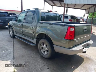 2003 Ford Explorer Sport Trac XLS z VIN 1FMZU67E93UB08190, wystawiony jako IAAI lot #42108621 z przebiegiem 233 972 mil mil oraz . Historia ofert i sprzedaży dostępna na DreamBid. Obrazek 3.