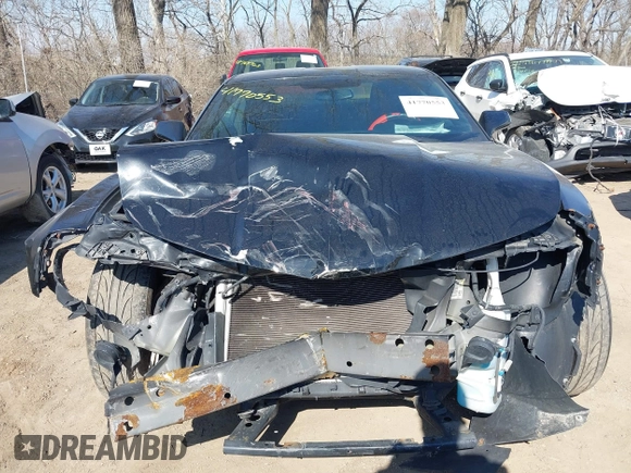 2014 Chevrolet Camaro LS z VIN 2G1FA1E36E9246671, wystawiony jako IAAI lot #41770553 z przebiegiem 170 121 mil mil oraz . Historia ofert i sprzedaży dostępna na DreamBid. Obrazek 13.