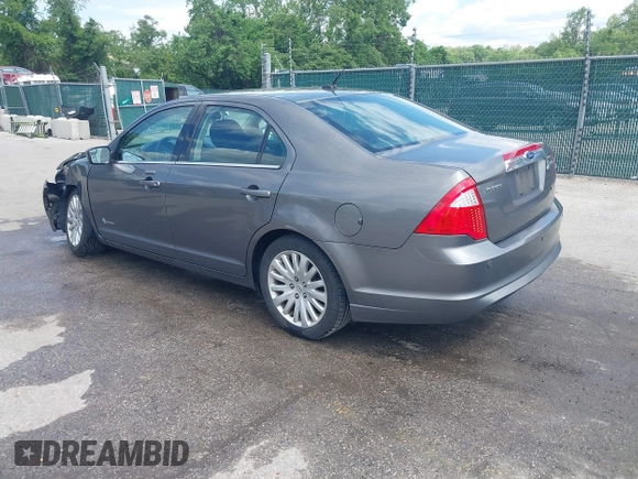 2011 Ford Fusion Hybrid with VIN 3FADP0L32BR132155, listed as a IAAI auction lot 42196233 with 77,900 mi miles and . Bid and sale history available at DreamBid. Image 3.