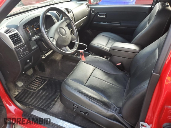 2011 GMC Canyon SLT with VIN 1GTH6NFE5B8130457, listed as a Copart auction lot 72559914 with 0 mi miles and Salvage Title. Bid and sale history available at carsss.com. Image 7.