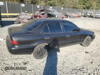1995 Geo Prizm z VIN 1Y1SK5261SZ077665, wystawiony jako Copart lot #76863434 z przebiegiem 176 535 mil mil oraz Szkody całkowita. Historia ofert i sprzedaży dostępna na DreamBid. Obrazek 3.