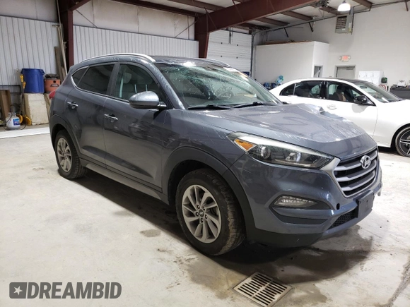 2018 Hyundai Tucson SEL with VIN KM8J3CA40JU600070, listed as a Copart auction lot 52966625 with 119,218 mi miles and Salvage title. Bid and sale history available at DreamBid. Image 4.