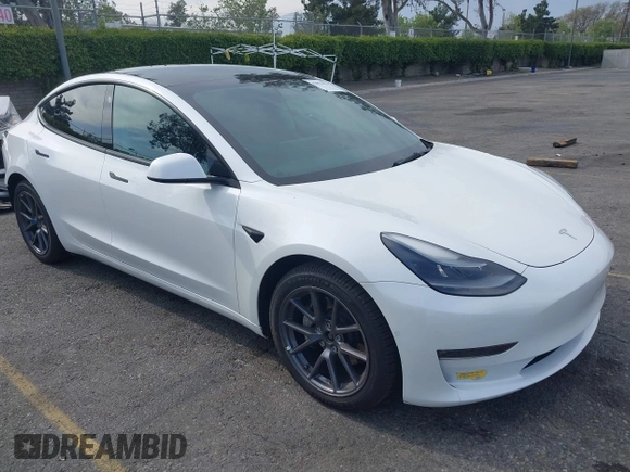 2021 Tesla Model 3 Long Range with VIN 5YJ3E1EB7MF089524, listed as a IAAI auction lot 42023474 with 19,757 mi miles and . Bid and sale history available at carsss.com. Image 1.