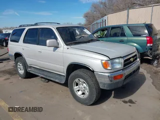 1998 Toyota 4Runner SR5 with VIN JT3HN86R5W0192618, listed as a IAAI auction lot 41643377 with 107,006 mi miles and . Bid and sale history available at DreamBid. Image 1.