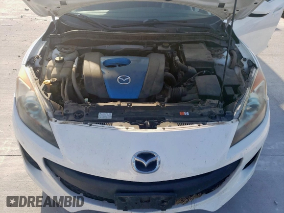 2013 Mazda 3 i Sport z VIN JM1BL1U74D1750112, wystawiony jako Copart lot #59871995 z przebiegiem 93 129 mil mil oraz Szkoda całkowita • Salvage title. Historia ofert i sprzedaży dostępna na DreamBid. Obrazek 11.