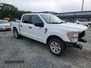 2021 Ford F-150 XL with VIN 1FTEW1C53MFB80059, listed as a Copart auction lot 58835805 with 85,998 mi miles and Salvage title. Bid and sale history available at DreamBid. Image 4.
