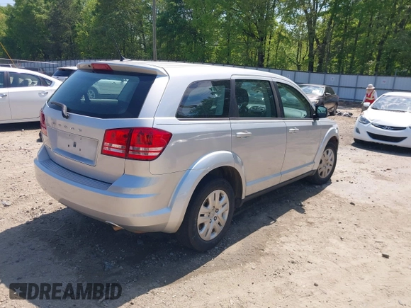 2014 Dodge Journey American Value with VIN 3C4PDCAB5ET112789, listed as a IAAI auction lot 42072546 with 149,094 mi miles and . Bid and sale history available at DreamBid. Image 4.