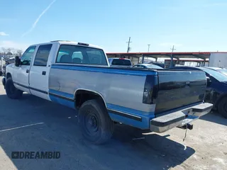 1996 GMC Sierra 1500 with VIN 1GTGC33R4TF018147, listed as a IAAI auction lot 41612770 with 106,443 mi miles and . Bid and sale history available at DreamBid. Image 3.
