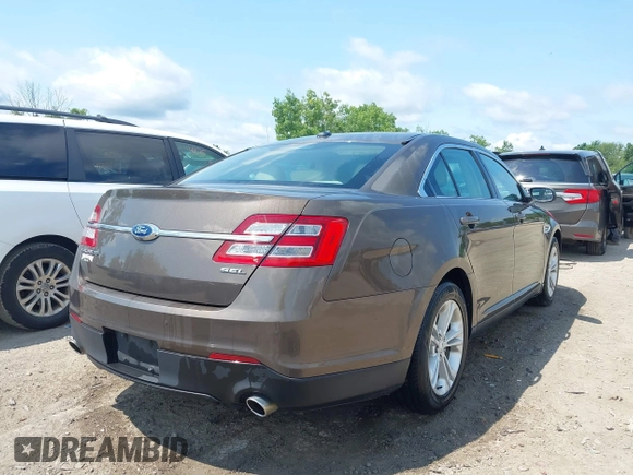 2015 Ford Taurus SEL with VIN 1FAHP2E82FG201994, listed as a IAAI auction lot 42750171 with 228,873 mi miles and . Bid and sale history available at DreamBid. Image 4.
