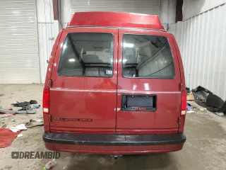 1992 GMC Safari z VIN 1GDEL19W2NB539396, wystawiony jako Copart lot #79221434 z przebiegiem 99 406 mil mil oraz Nie do naprawy. Historia ofert i sprzedaży dostępna na DreamBid. Obrazek 6.